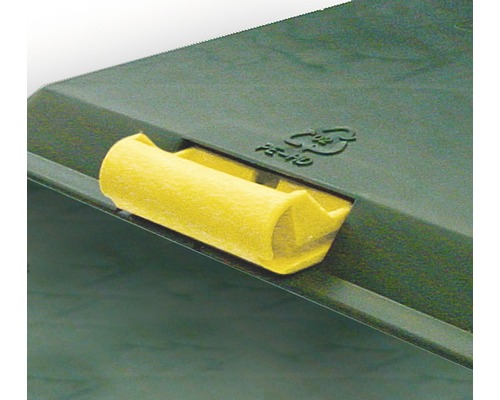 Detalj av ett soptunnelock med gult handtag