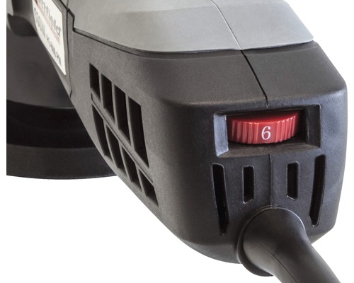 Detaljbild av en slipmaskin med röd hastighetsregulator inställd på läge sex.