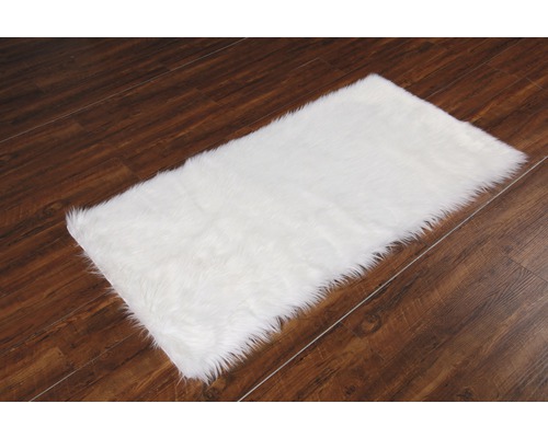 Vit matta på trägolv