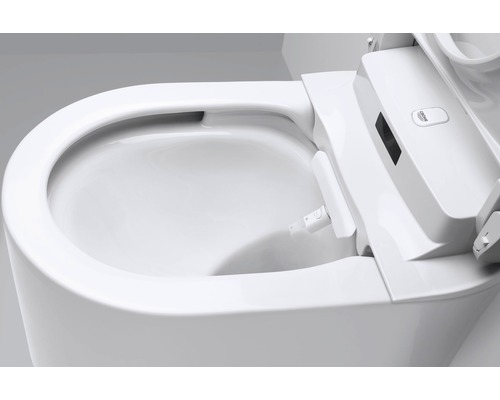 Närbild av en toalett med bidéfunktion