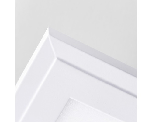 Detaljvy av en vit fotoram