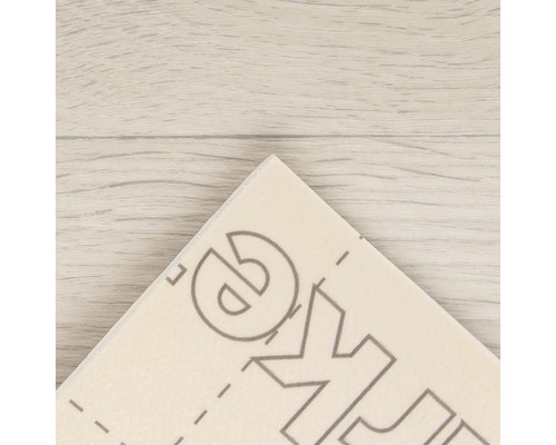 Detaljvy av en vinylplatta med markeringslinjer