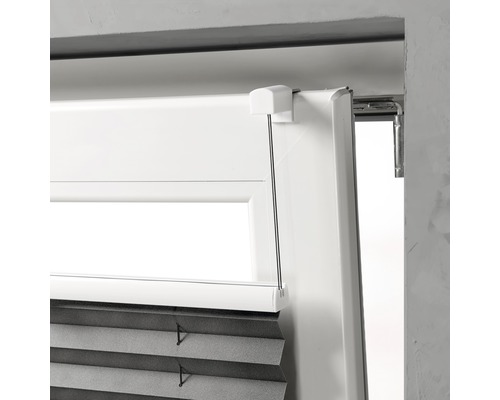 Detalj av ett plissésystem på ett fönster