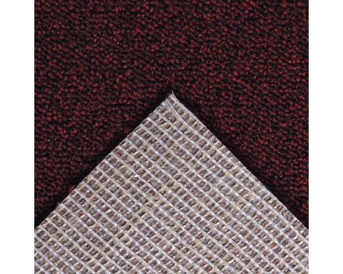 Närbild av en matta med vävd struktur på baksidan