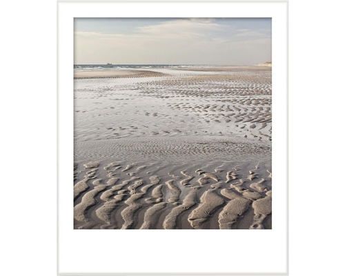 Inramad väggbild med strandmotiv