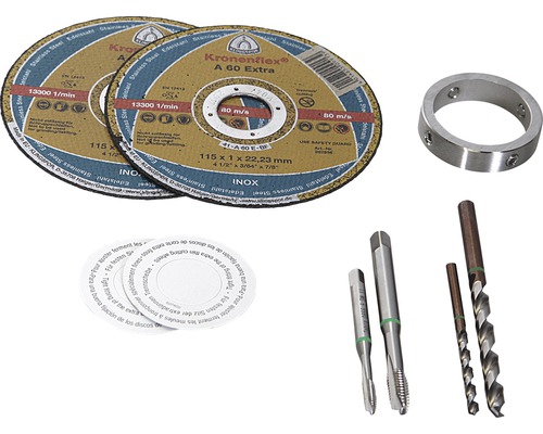 Två kapskivor, en ring, två gängtappar, två borrar och pappersbrickor för kapskivor.