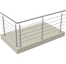 Räcke med rostfria stålvajrar på en betongyta