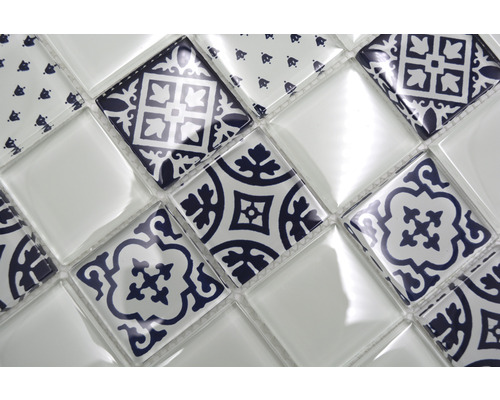 Mosaikplattmönster med geometriska och blommiga motiv