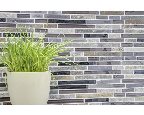 Väggplattmosaik med växt i kruka