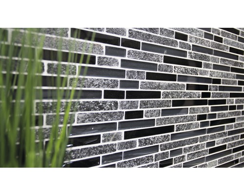 Mosaik med rektangulära stenar i olika texturer och nyanser.