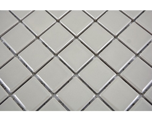Närbild av fyrkantiga mosaikplattor