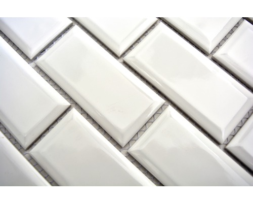 Rektangulära, glänsande plattor i fiskbensmönster