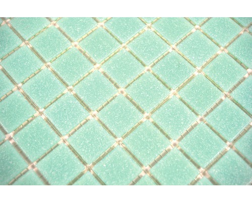 Mosaikplattor av glas på nät