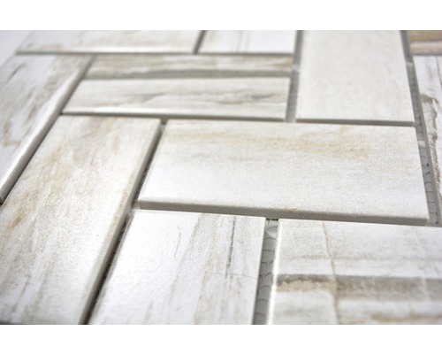 Detalj av mosaikplattor i stengods