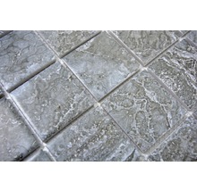 Närbild av mosaikplattor med stenutseende