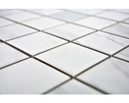 Mosaikplattor av marmor