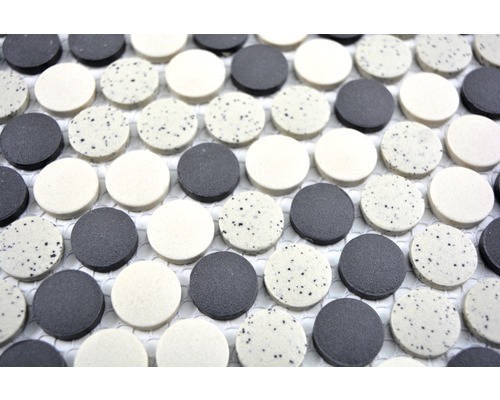 Keramiska mosaikplattor i rund form med prickigt mönster