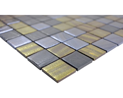 Mosaikplattor i silver och guld
