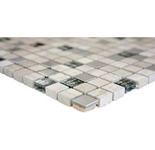 Mosaikplatta av natursten och glas