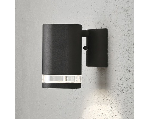 Svart vägglampa med transparent insats