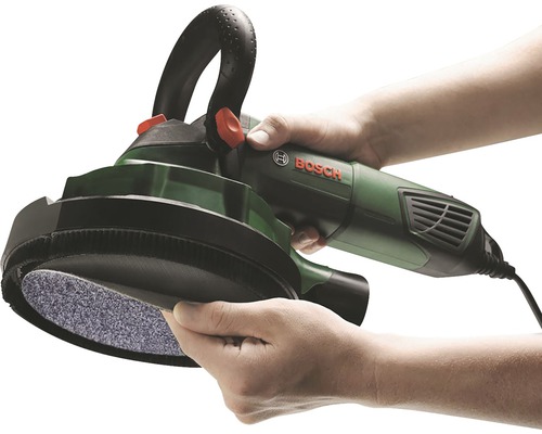 Betongslipmaskin i handen