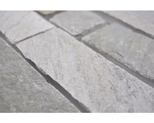 Naturstensmosaik av travertin