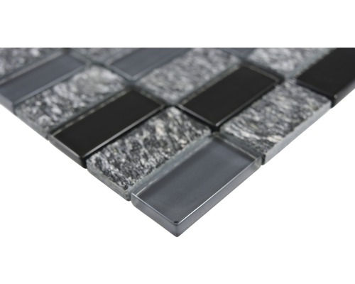 Mosaikplatta av glas och sten