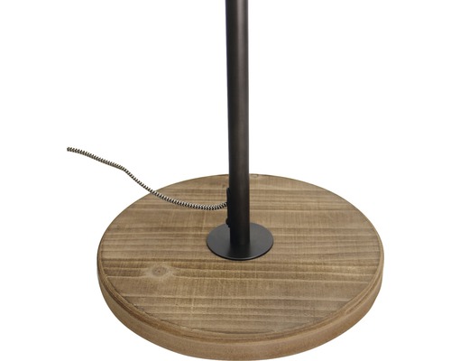 Detalj av lampfot i trä med metalldetaljer