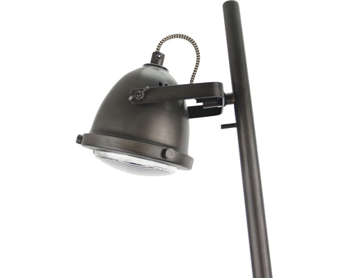 Detaljvy av en golvlampa med justerbart lamphuvud