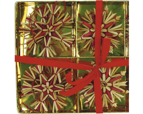 Förpackning med fyra halmstjärnor och rött band