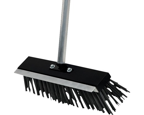 Sop med metallhandtag och borst