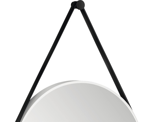 Detalj av en rund spegel med svart upphängning