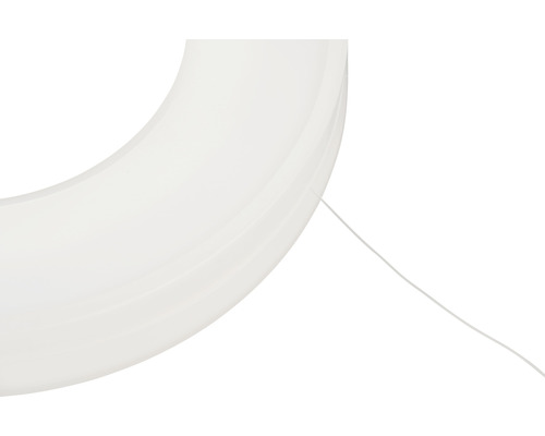 Närbild av en rund LED-lampa med strömkabel