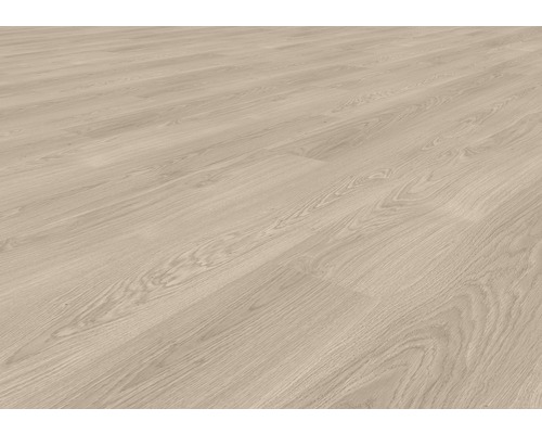 Närbild av ett ljust laminatgolv med träutseende