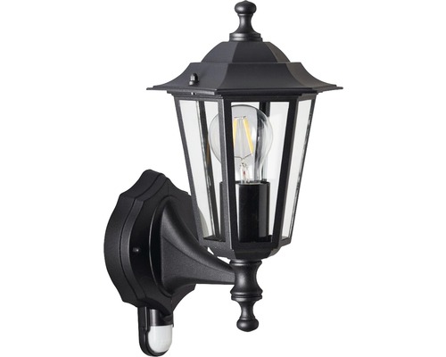 Svart utomhusvägglampa med rörelsedetektor och klart glas