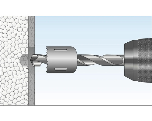 Borrmaskin med hålsåg borrar ett hål i en vägg.