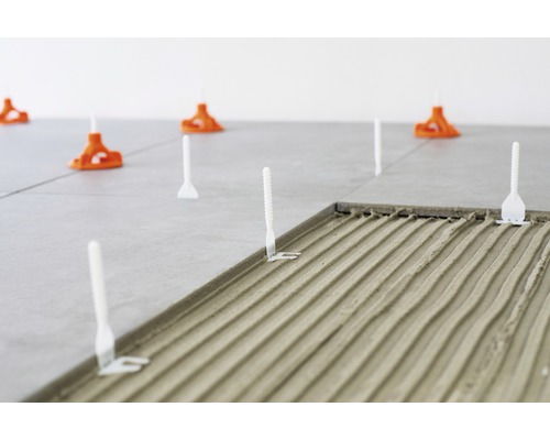 Kakelläggning med nivelleringssystem