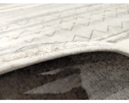 Detaljvy av en matta med mönster