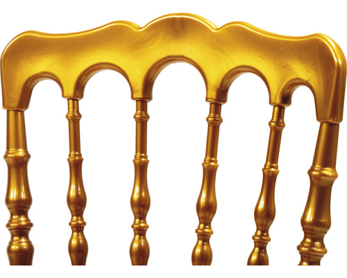 Detalj av ryggstödet på en gyllene stol