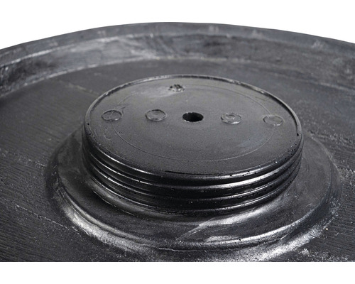 Detaljvy av ett regnvattentunnalock