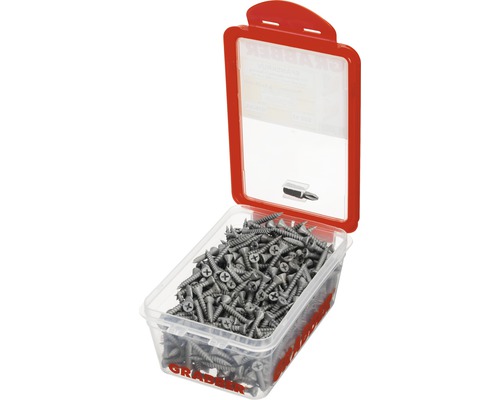 Skruvar i transparent låda med rött lock