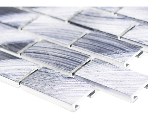 Närbild av mosaikplattor.