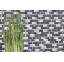 Mosaikplattvägg med gräsdekoration