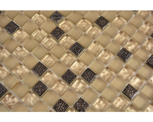 Mosaikplattor av glas och metall