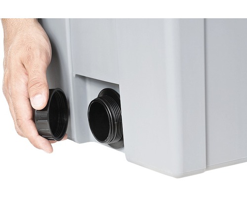 Detaljvy av en vattenbehållare med anslutningsnippel och matchande lock