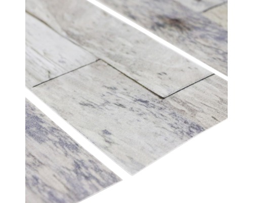 Flera vinylgolvplattor med träutseende