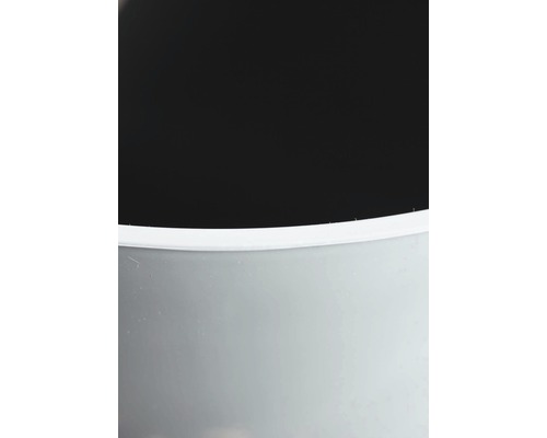 Detaljvy av en rund blomkruka