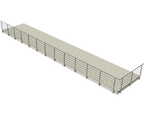 Lång betongbro med metallräcke