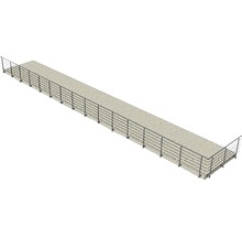 Lång betongbro med metallräcke