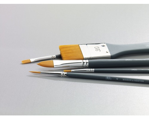 Olika penslar av märket Winsor & Newton för konstnärsmaterial